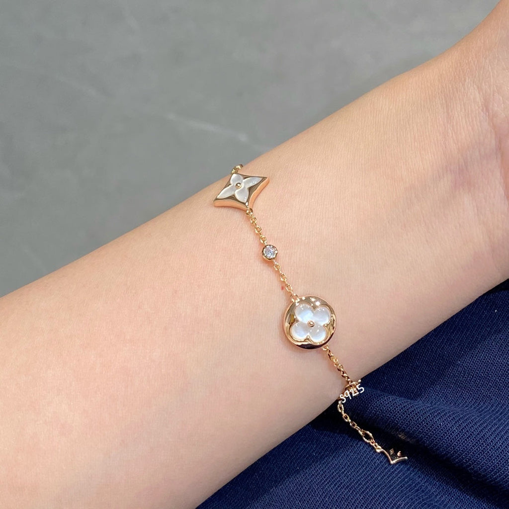 ¡®Loco¡¯STAR AND SUN 4 MOTIF WHITE MOP PINK GOLD BRACELET